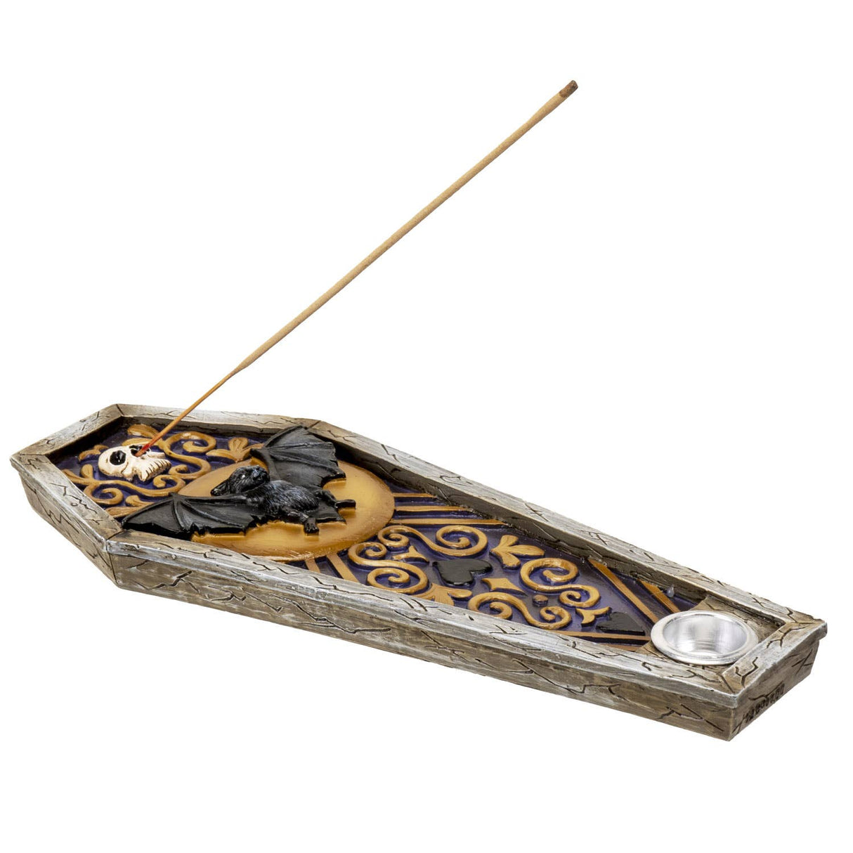 A coffin-shaped incense holder with a bat and skull design, a wooden incense stick, and a small metal bowl, shown on a plain white background.