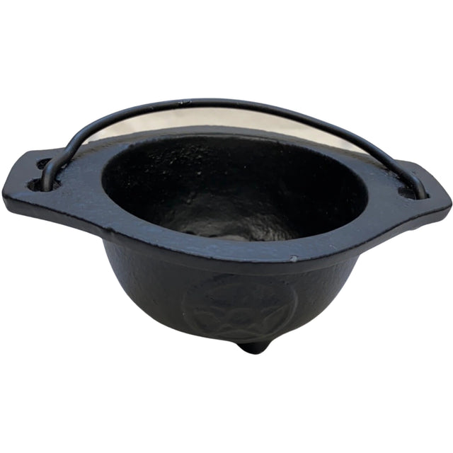 Small black cast iron cauldron with a pentagram design and a metal handle.