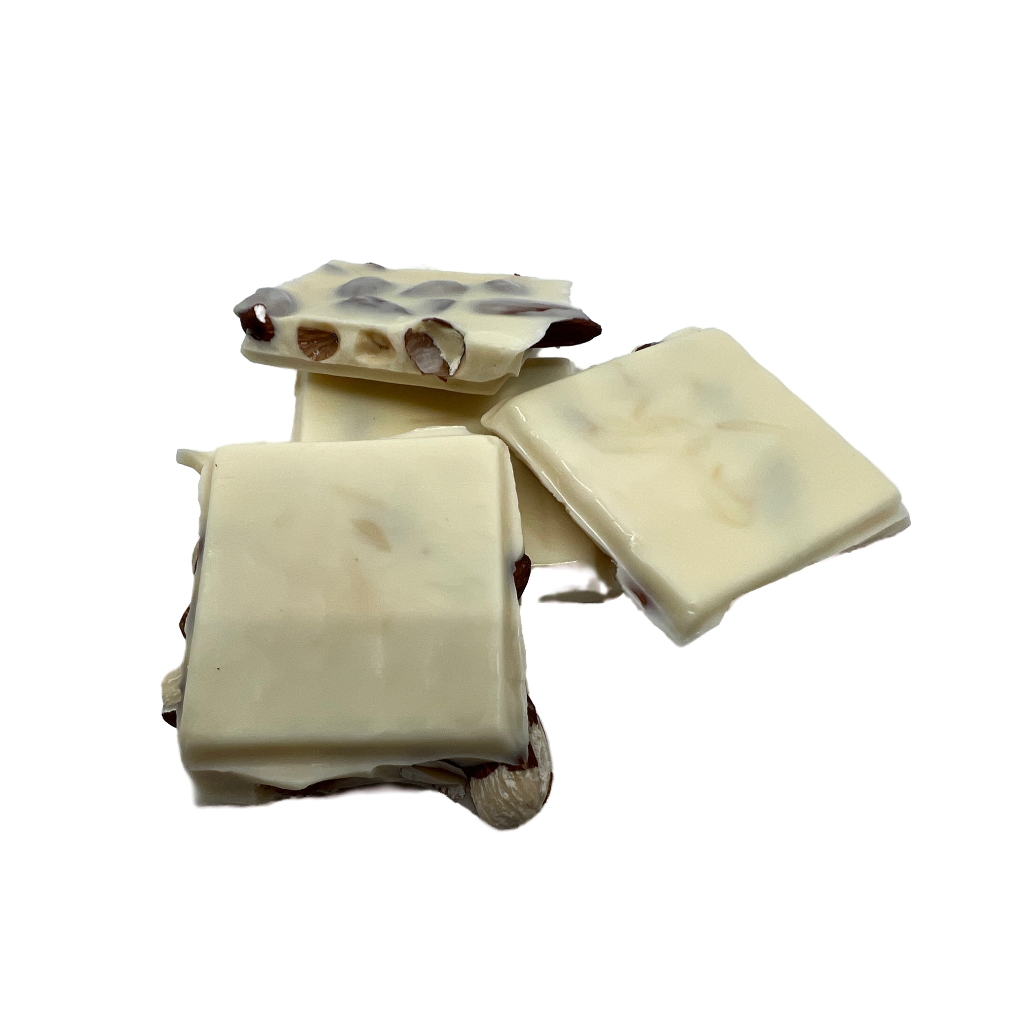 Large squares of white chocolate with almonds showing through