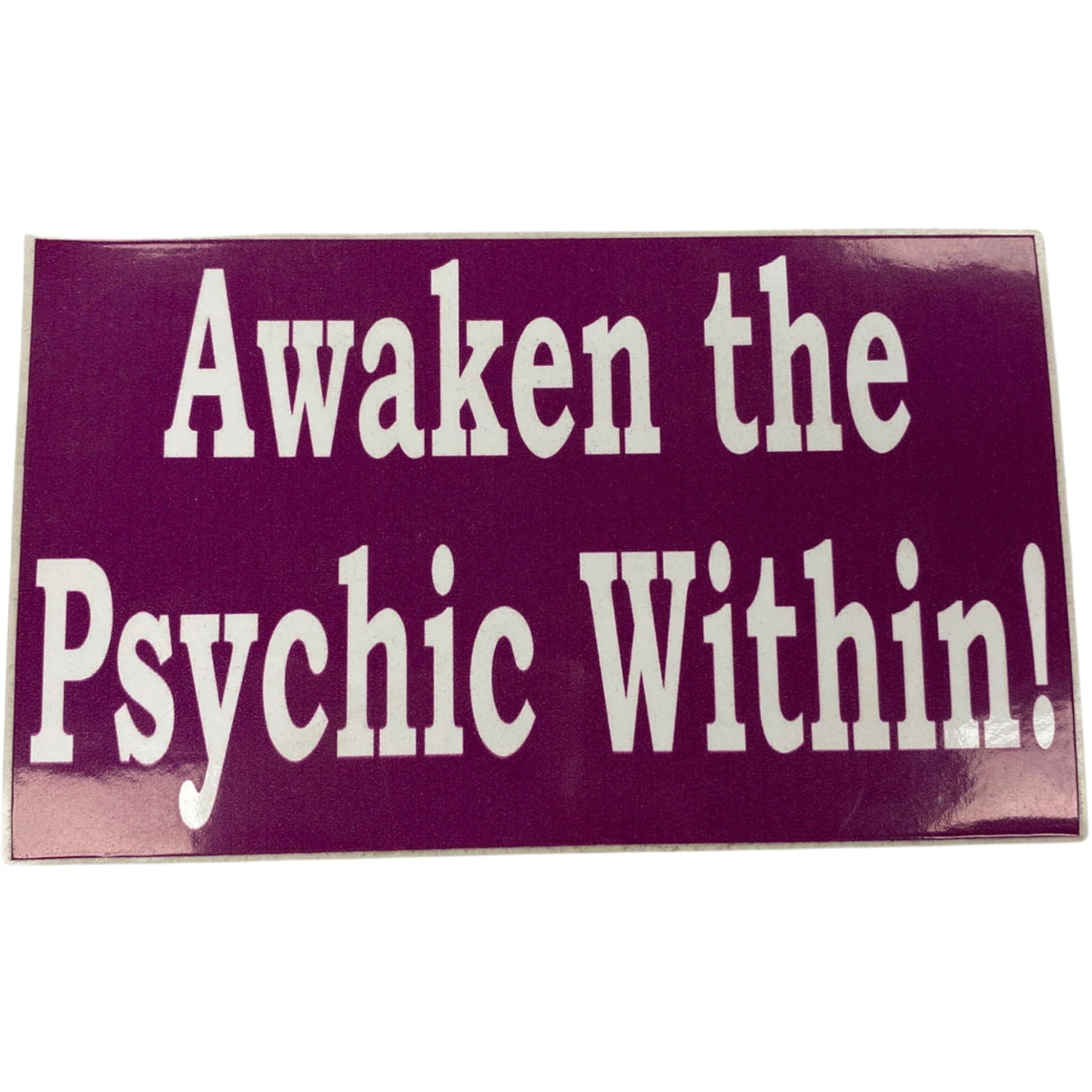 Awaken the Psychic Within sticker, purple background with white text.