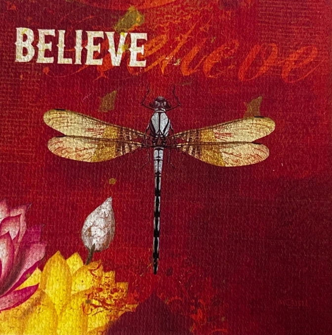 Believe canvas magnet with dragonfly and floral background.