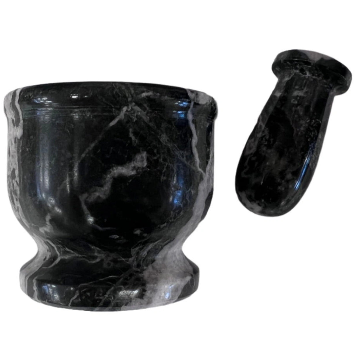 Black marble mortar and pestle.