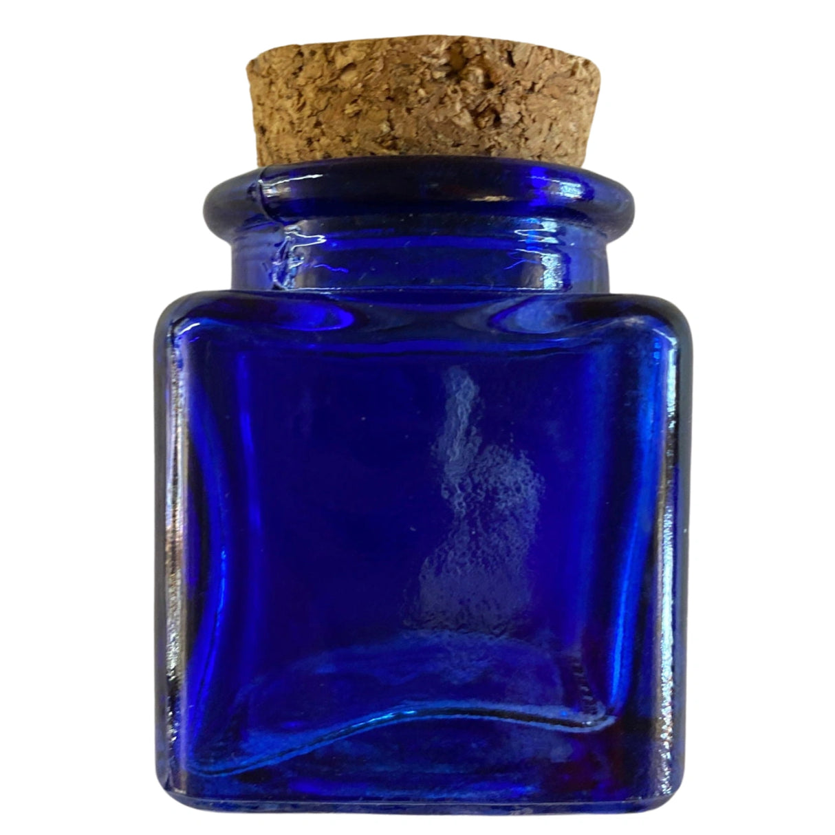 Blue glass jar with a cork stopper.