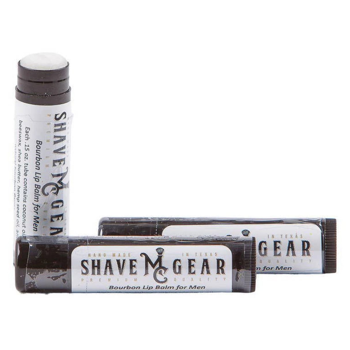Three black tubes of Bourbon Shea Butter Lip Balm. Each tube has a white label with the product name, ingredients, and the brand "Shave Gear."