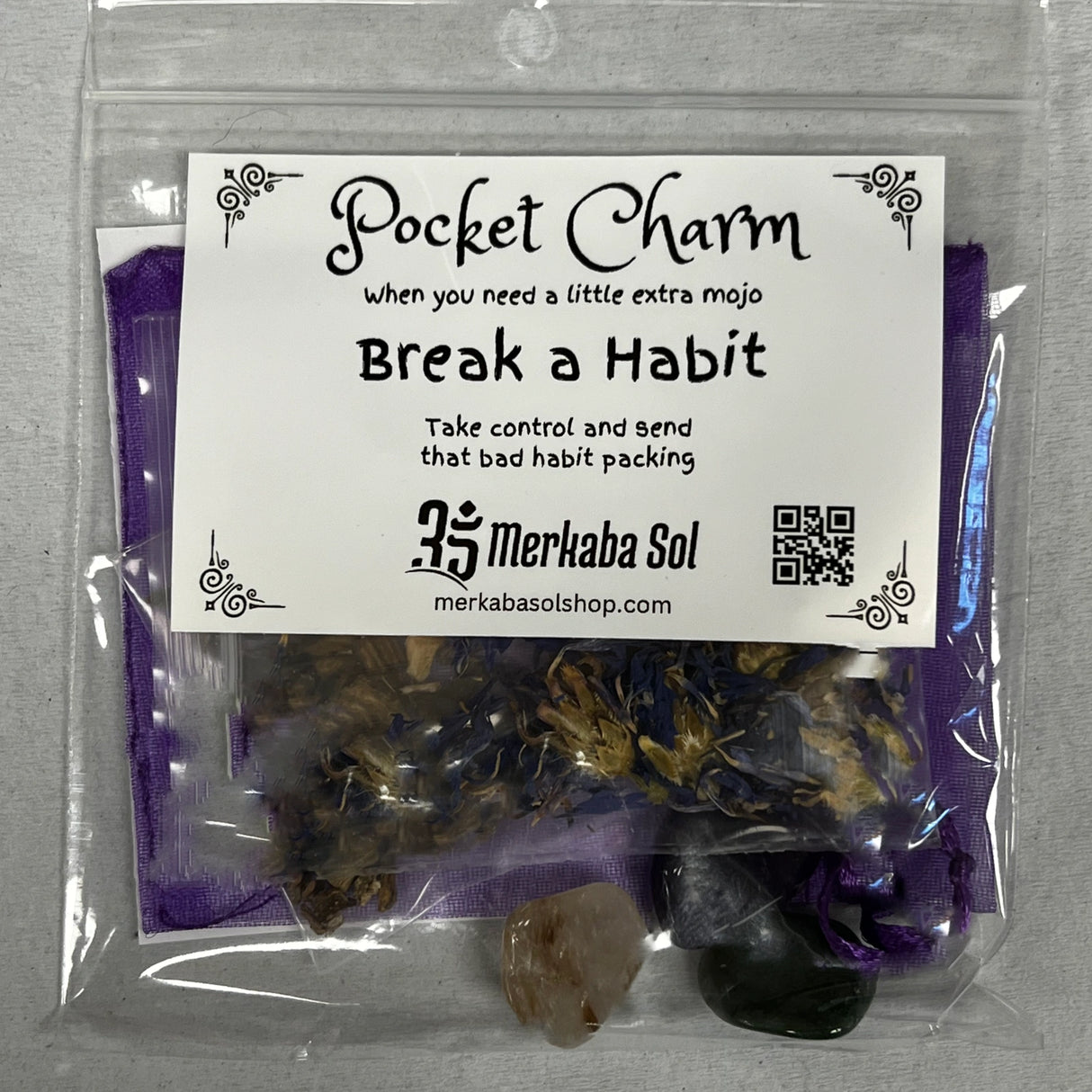 Break a Habit Pocket Charm Kit with Transparent packaging, White label, and Black text.