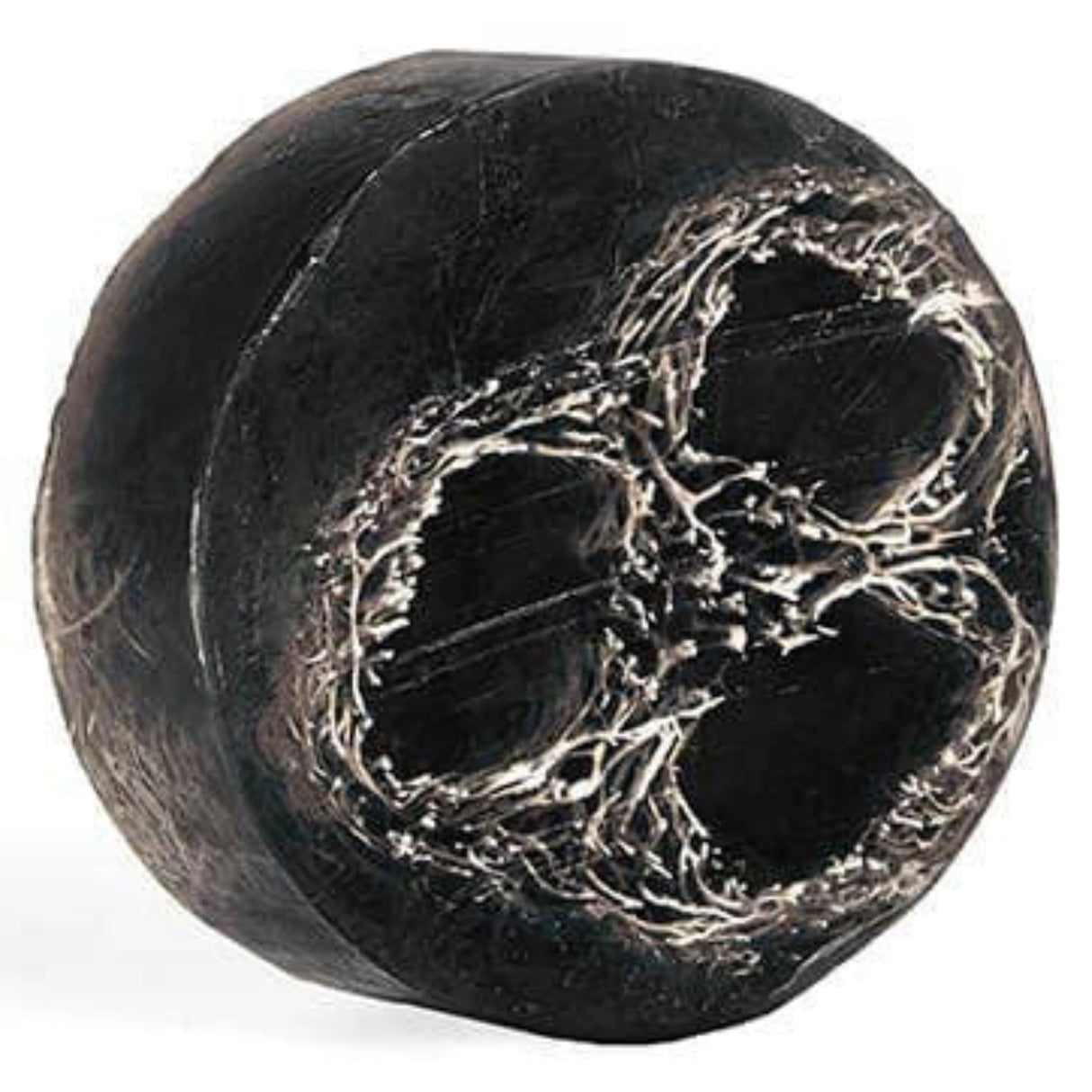 Black loofah soap with a smooth, spherical shape and visible loofah fibers.