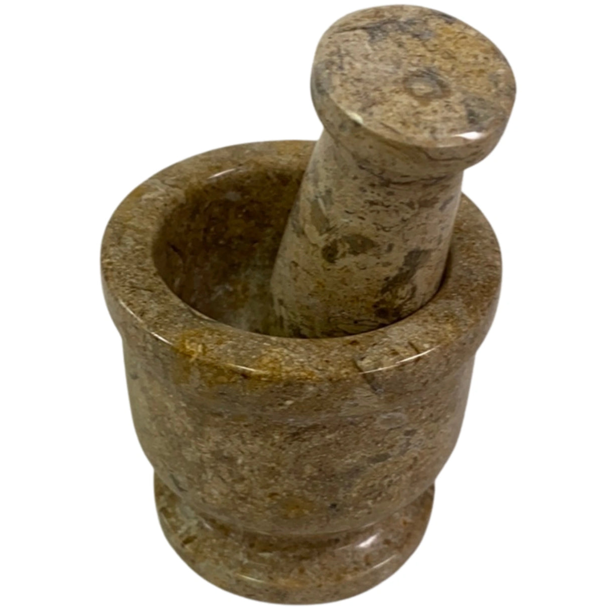 Small brown marble mortar and pestle set with fossilized coral inclusions.