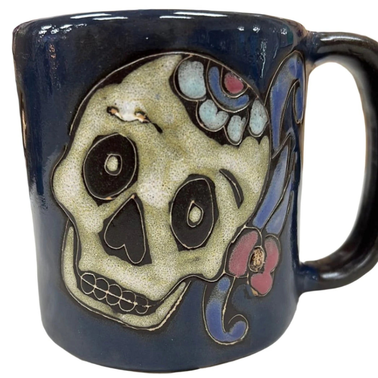 Stoneware mug with Day of the Dead sugar skull design.