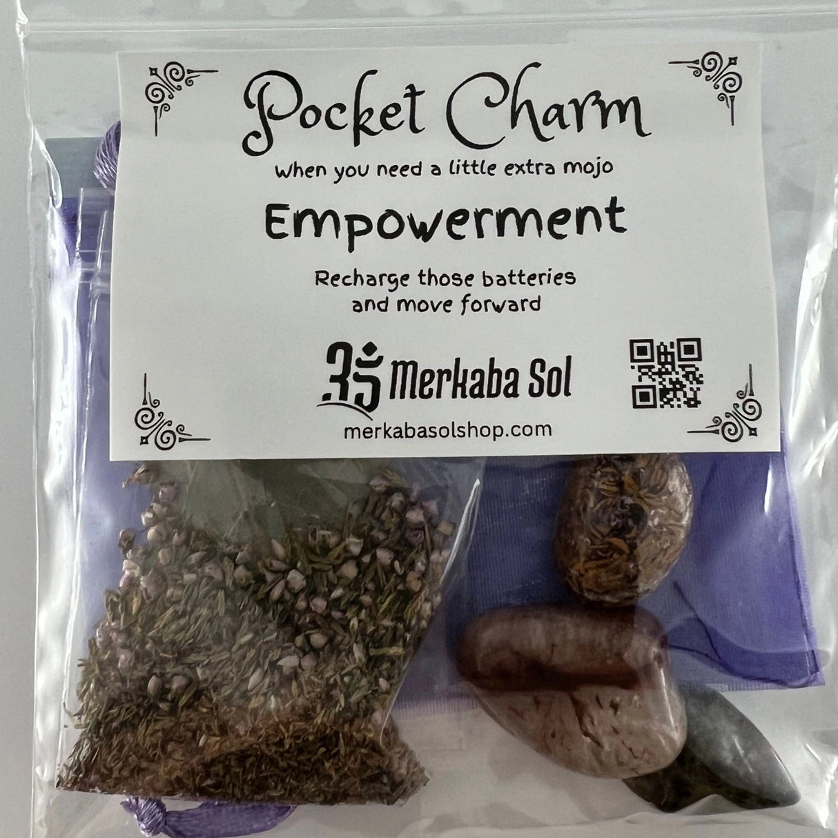 Empowerment Pocket Charm Kit with Transparent packaging, White label, and Black text.