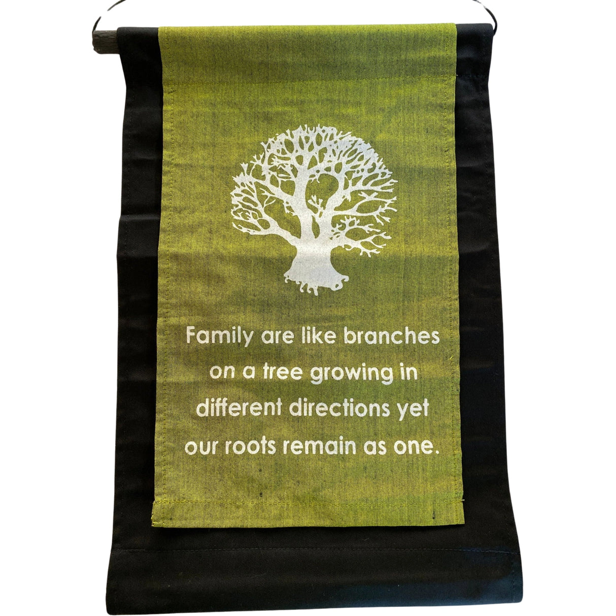 Green banner with a white tree and the quote "Family are like branches on a tree growing in different directions yet our roots remain as one."