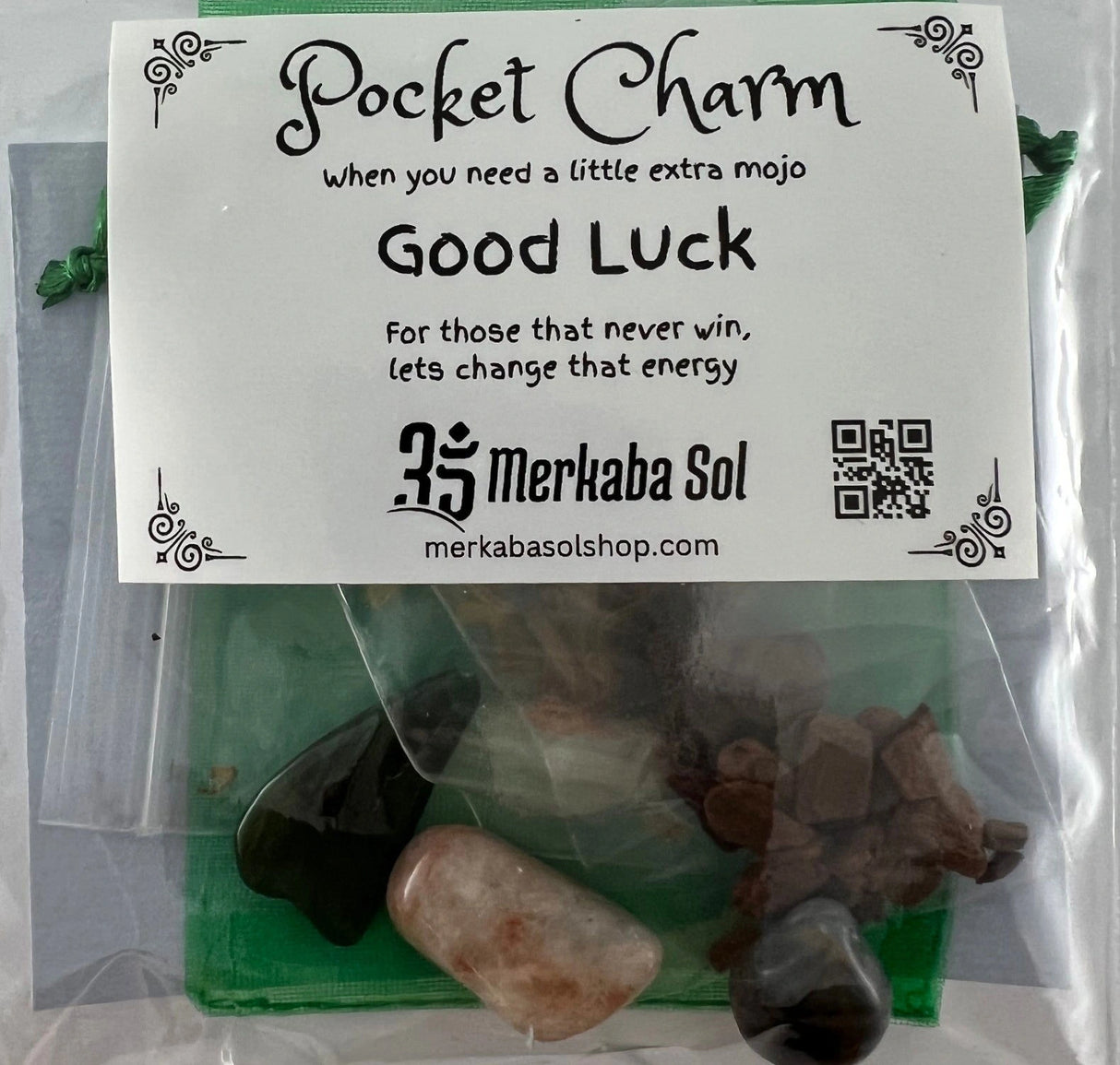 Good Luck Pocket Charm Kit with Transparent packaging, White label, and Black text.