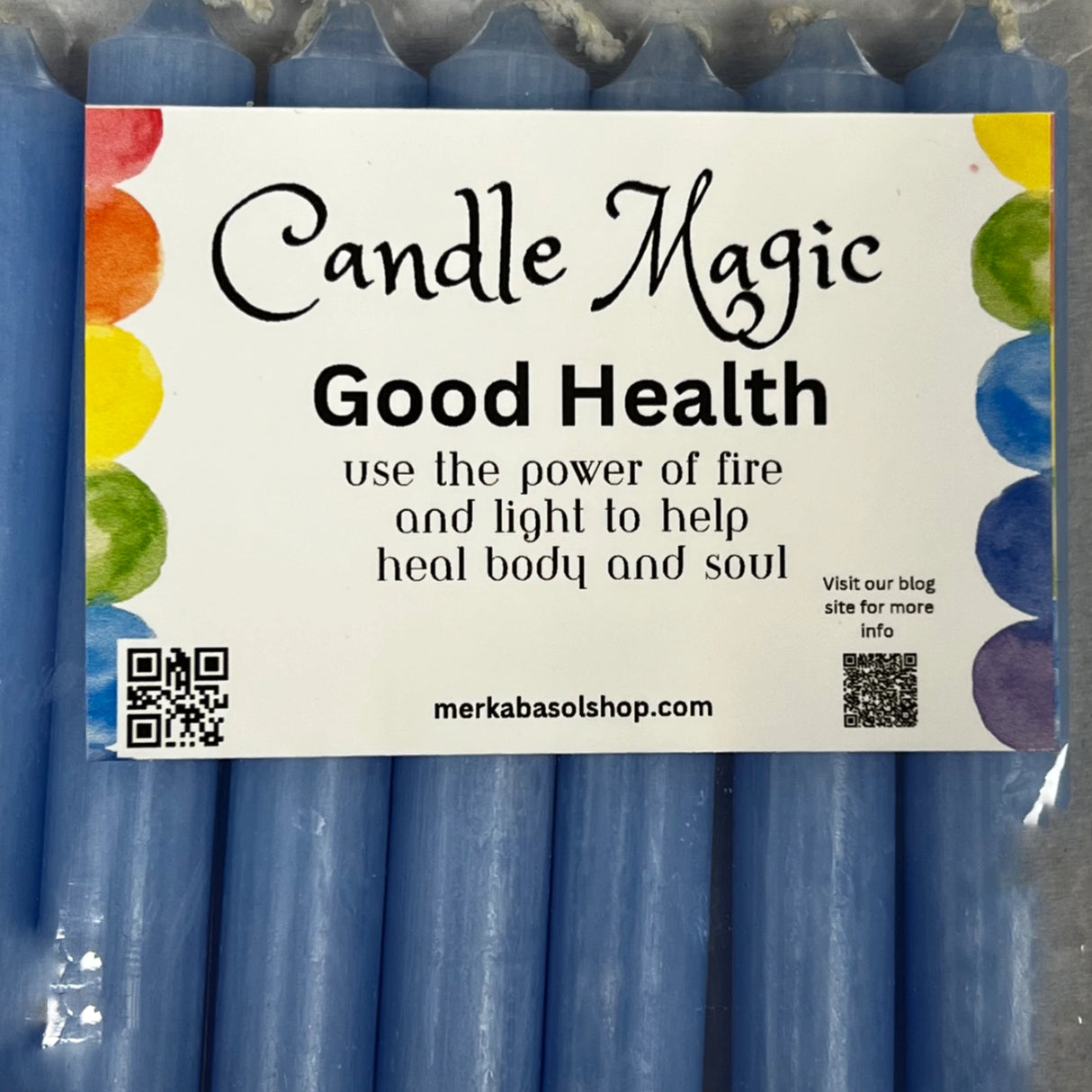Package of blue candles with a label that says "Candle Magic: Good Health.