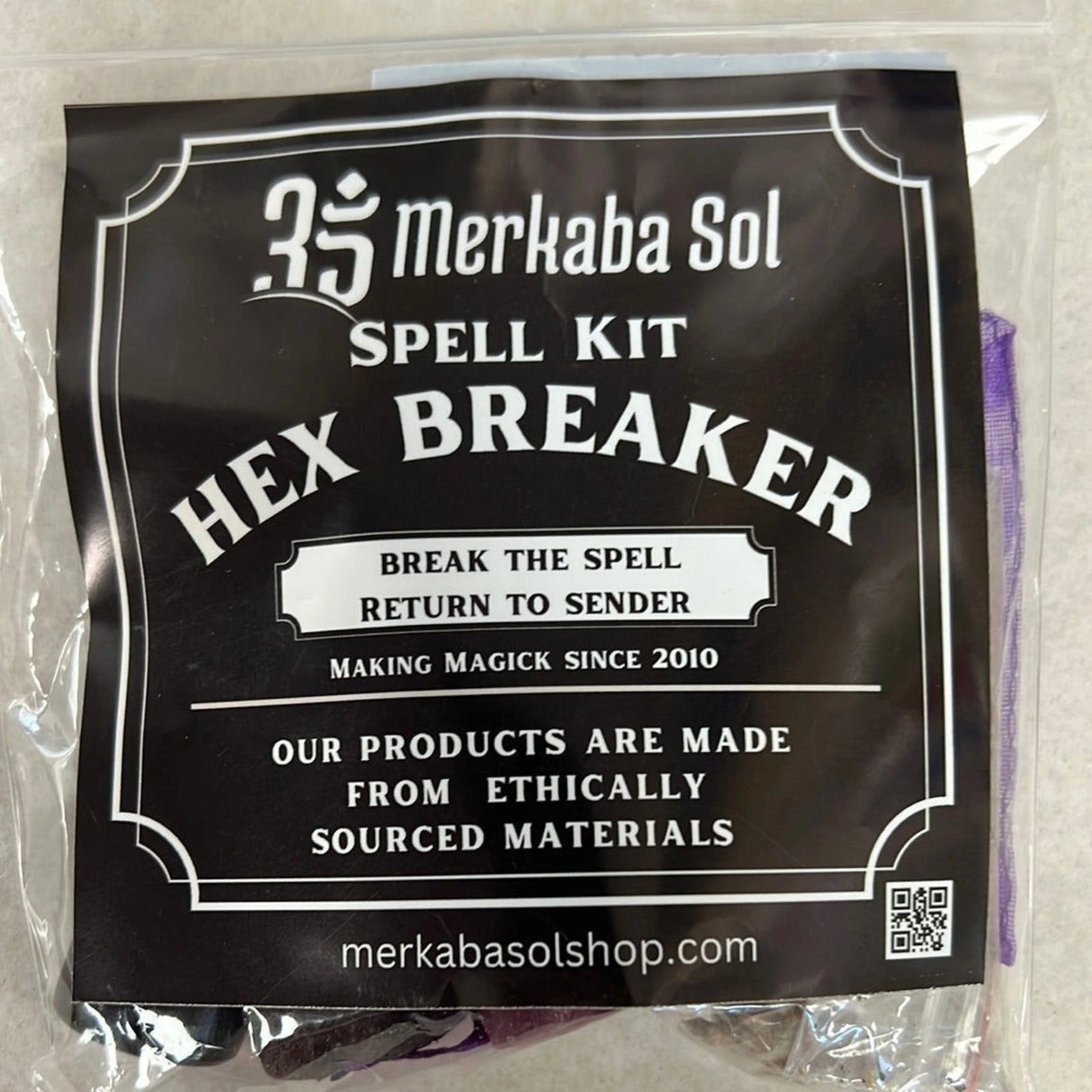 Hex Breaker Spell Kit with Transparent packaging, Black Label, and white text.