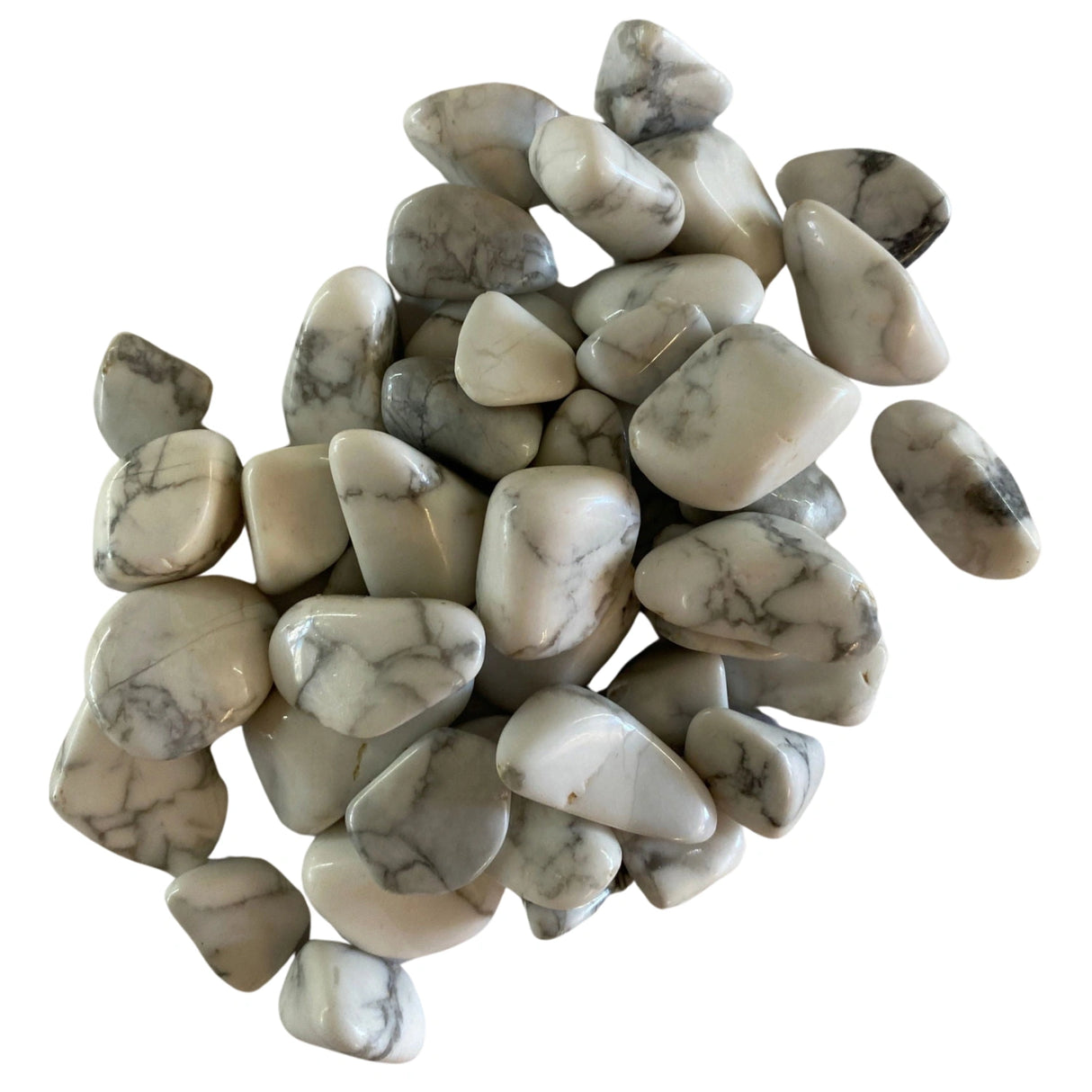 Tumbled Howlite stones with a smooth, polished finish and a white color with gray or black veining.