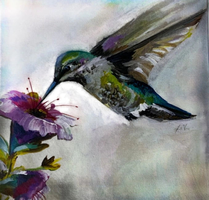Hummingbird magnet with colorful painting of a hummingbird feeding on a flower.
