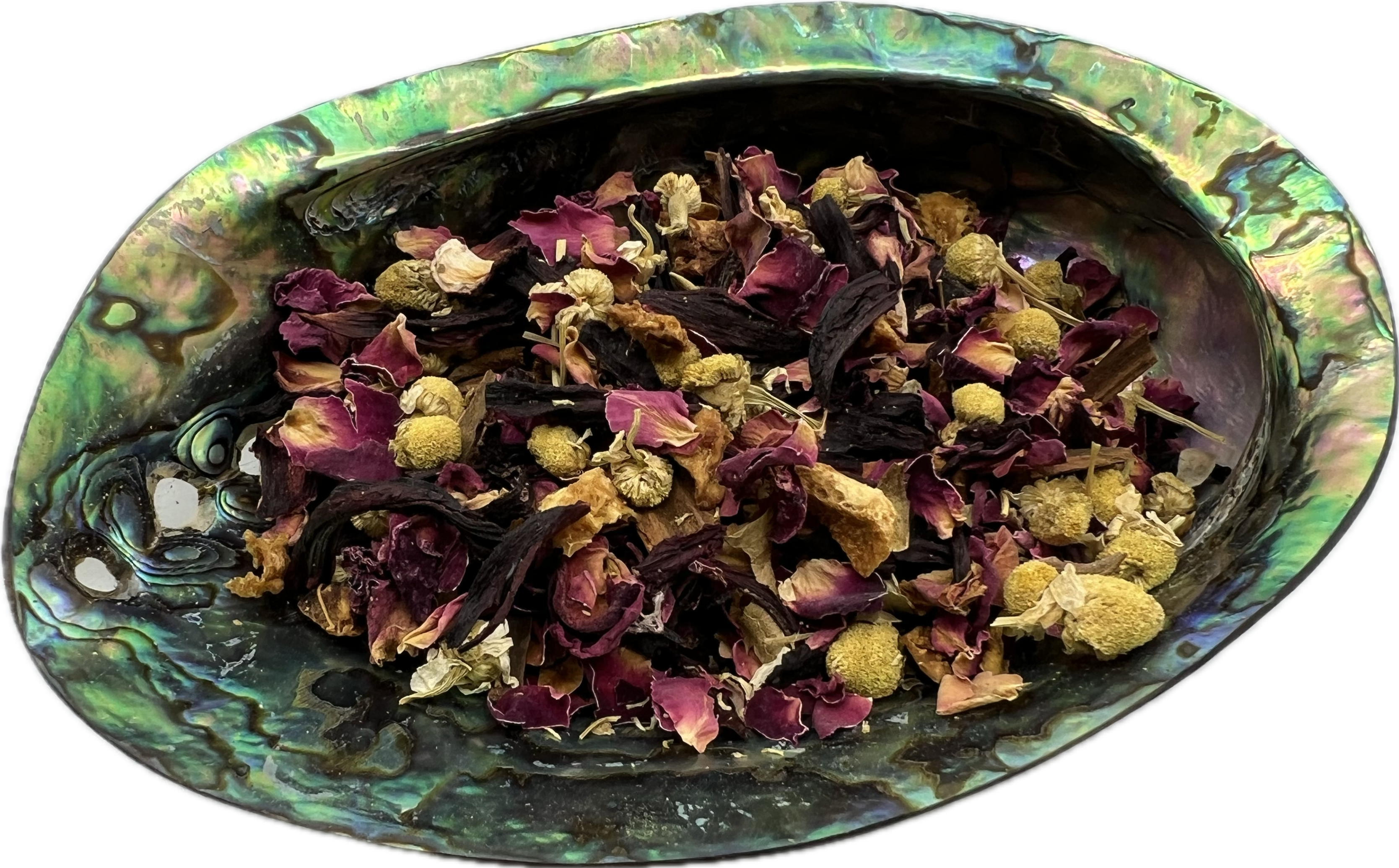 a colorful mix of dried herbs in a shell bowl 