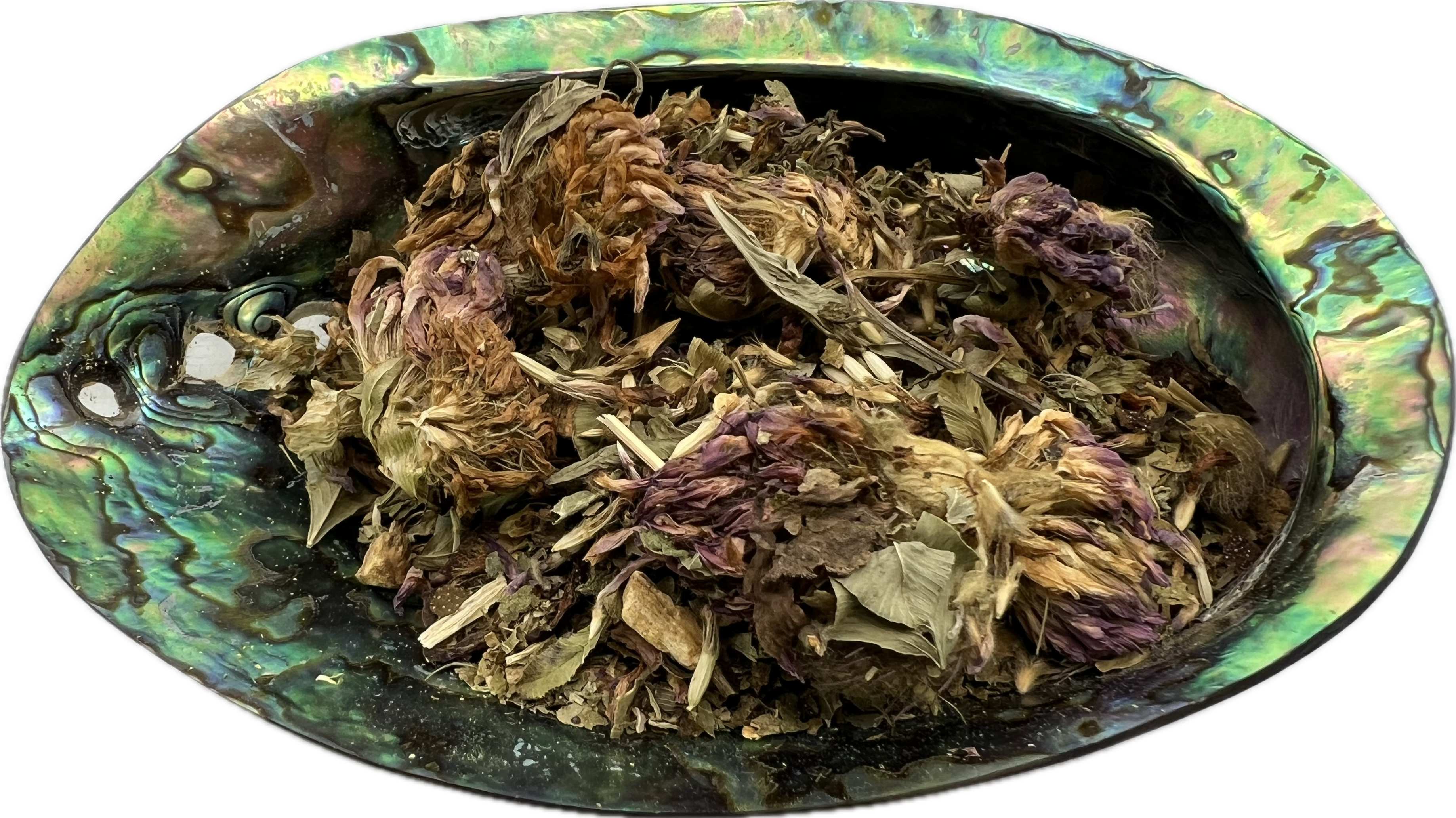 a mix of dried herbs in a shell bowl