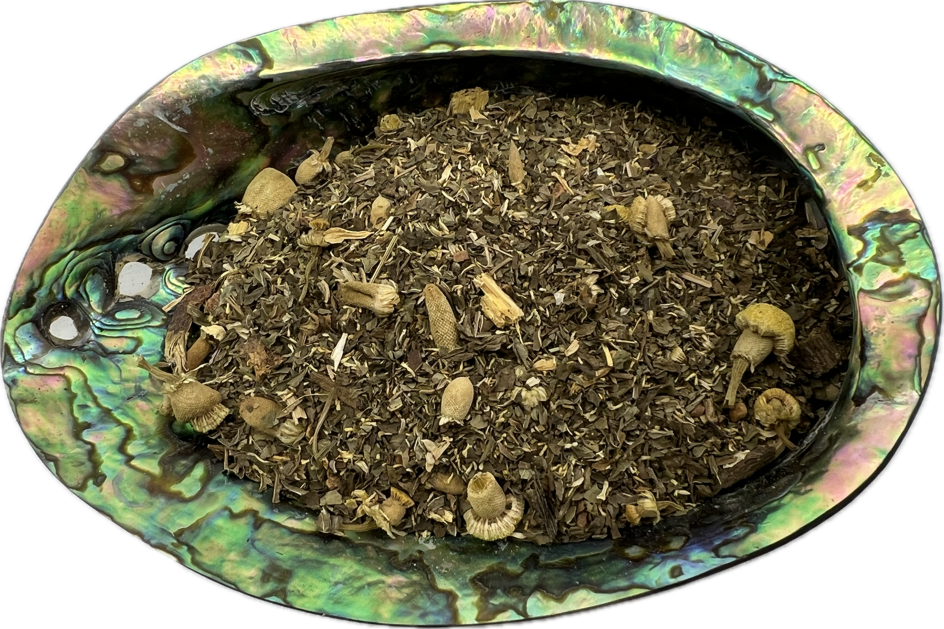 a mix of dried herbs in a shell bowl 