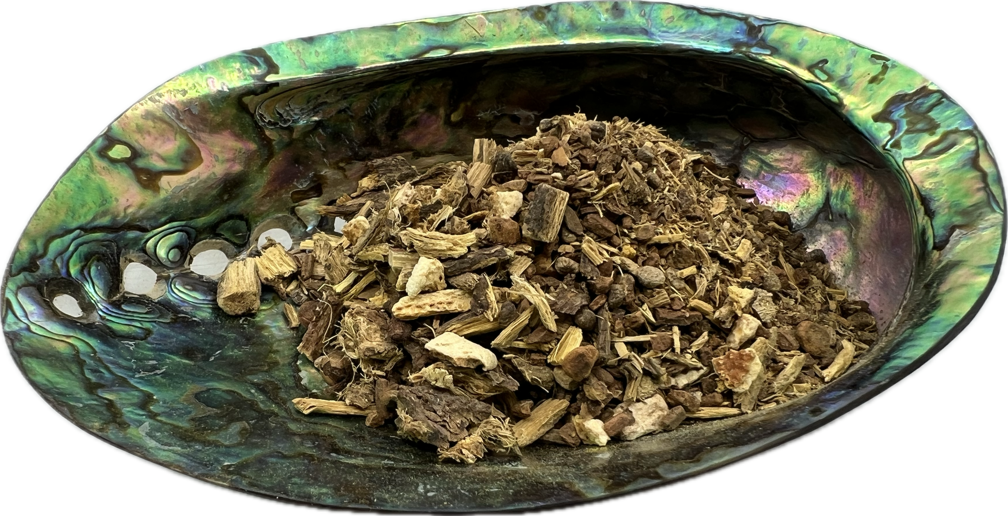 a lix of dried herbs in a shell bowl