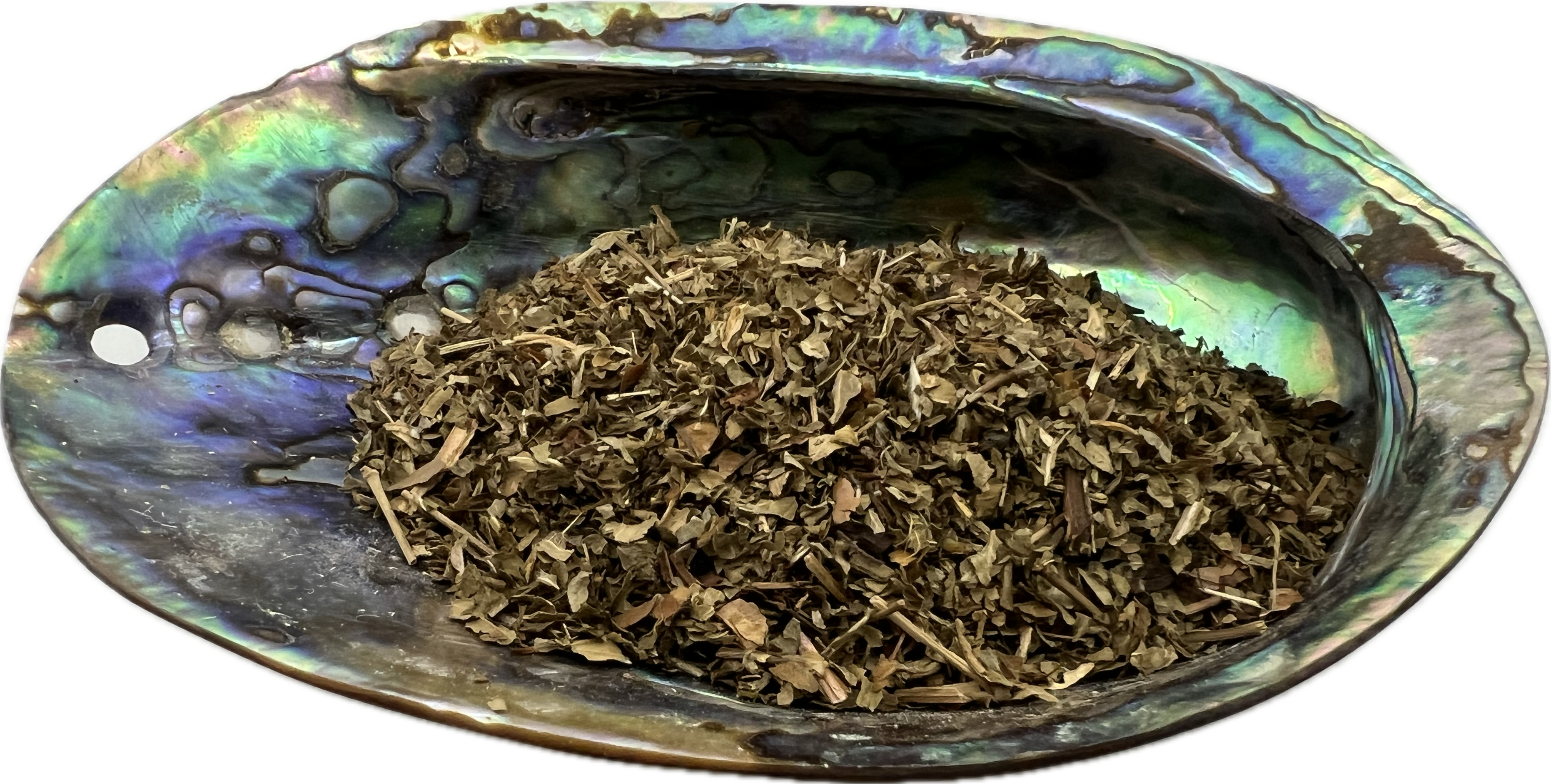 mixed dried herbs in a shell bowl 