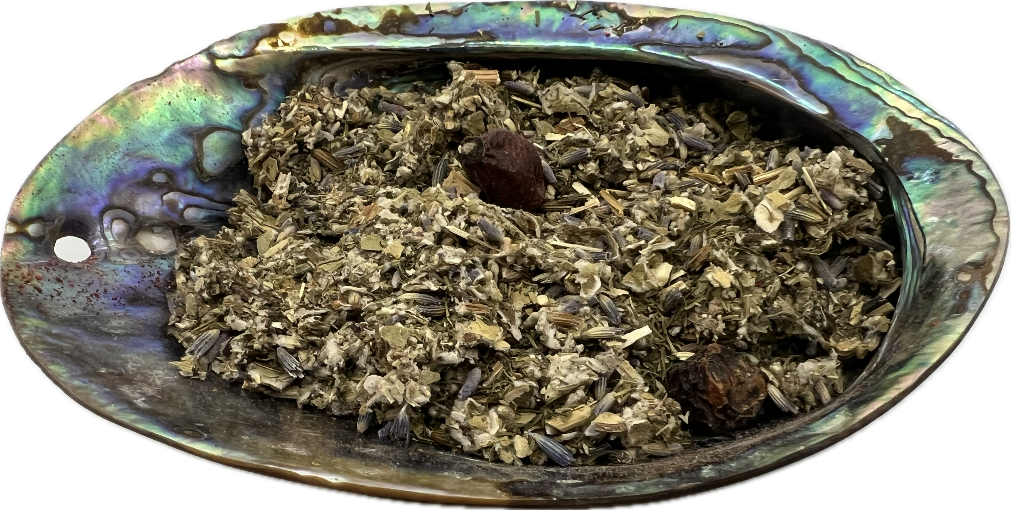 dried mix of herbs in a shell bowl