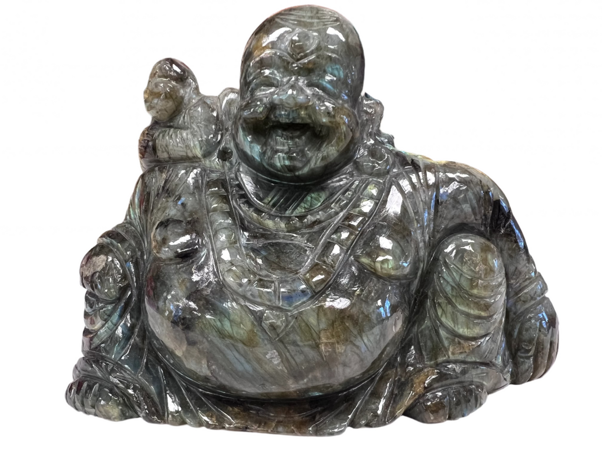 Silver blue crystal carved in shape of sitting man