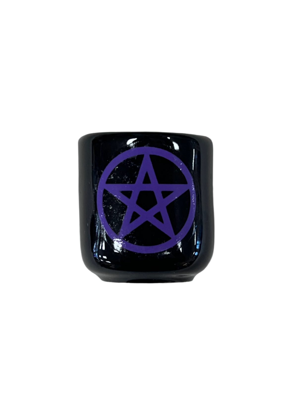 black cube shaped candle holder that is black wit a purple pentacle on it