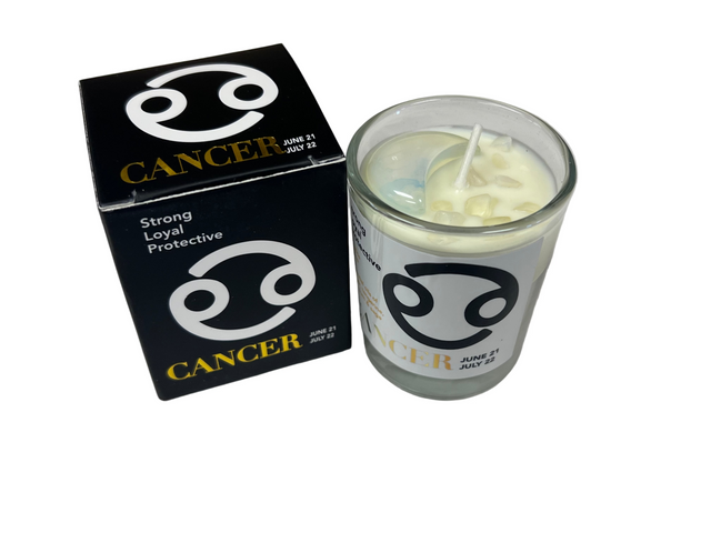 Candle with Cancer zodiac symbol packaging on a white background