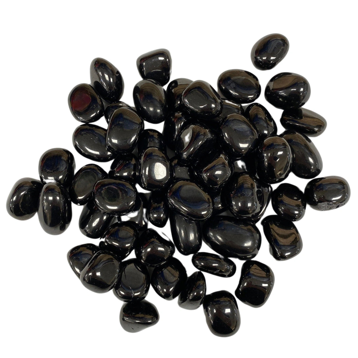 Tumbled Jet stones with a smooth, polished finish and a deep black color.
