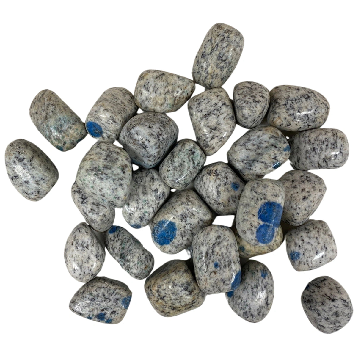 Tumbled K2 stones with a smooth, polished finish and a distinctive speckled pattern featuring blue and white hues.
