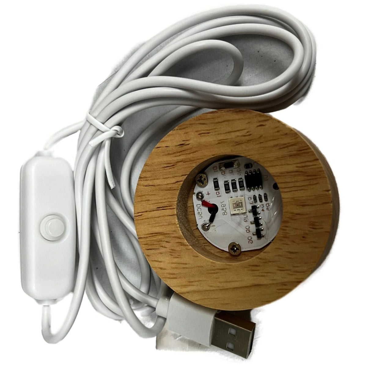 Wooden LED light base with a power switch and USB cable.