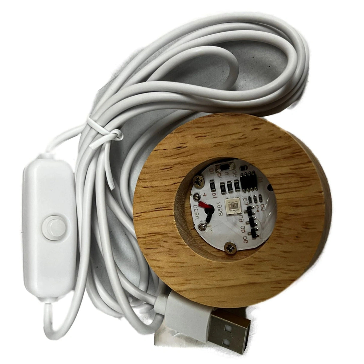 Wooden LED light base with a power switch and USB cable.