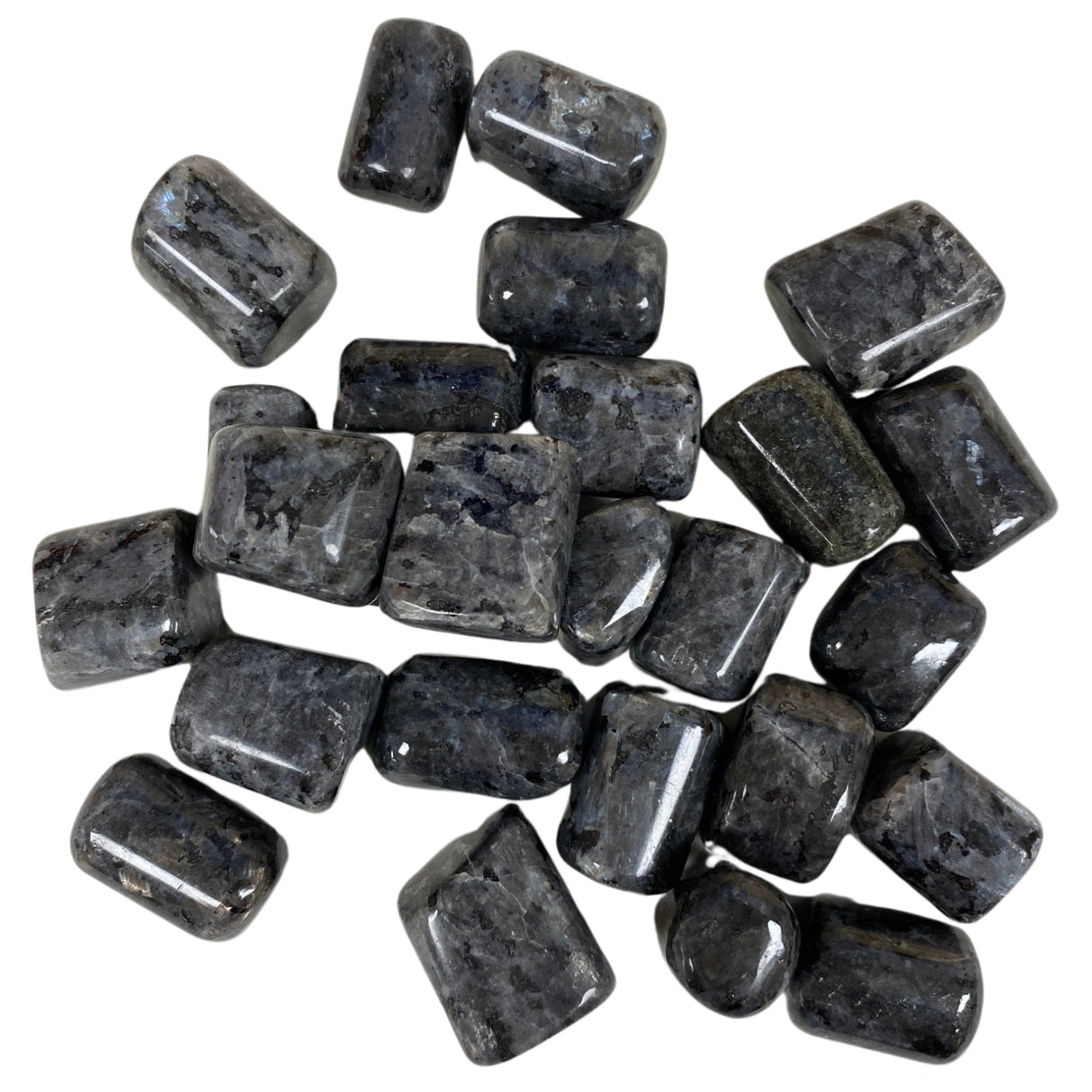Tumbled Larvikite stones with a smooth, polished finish and a dark gray color