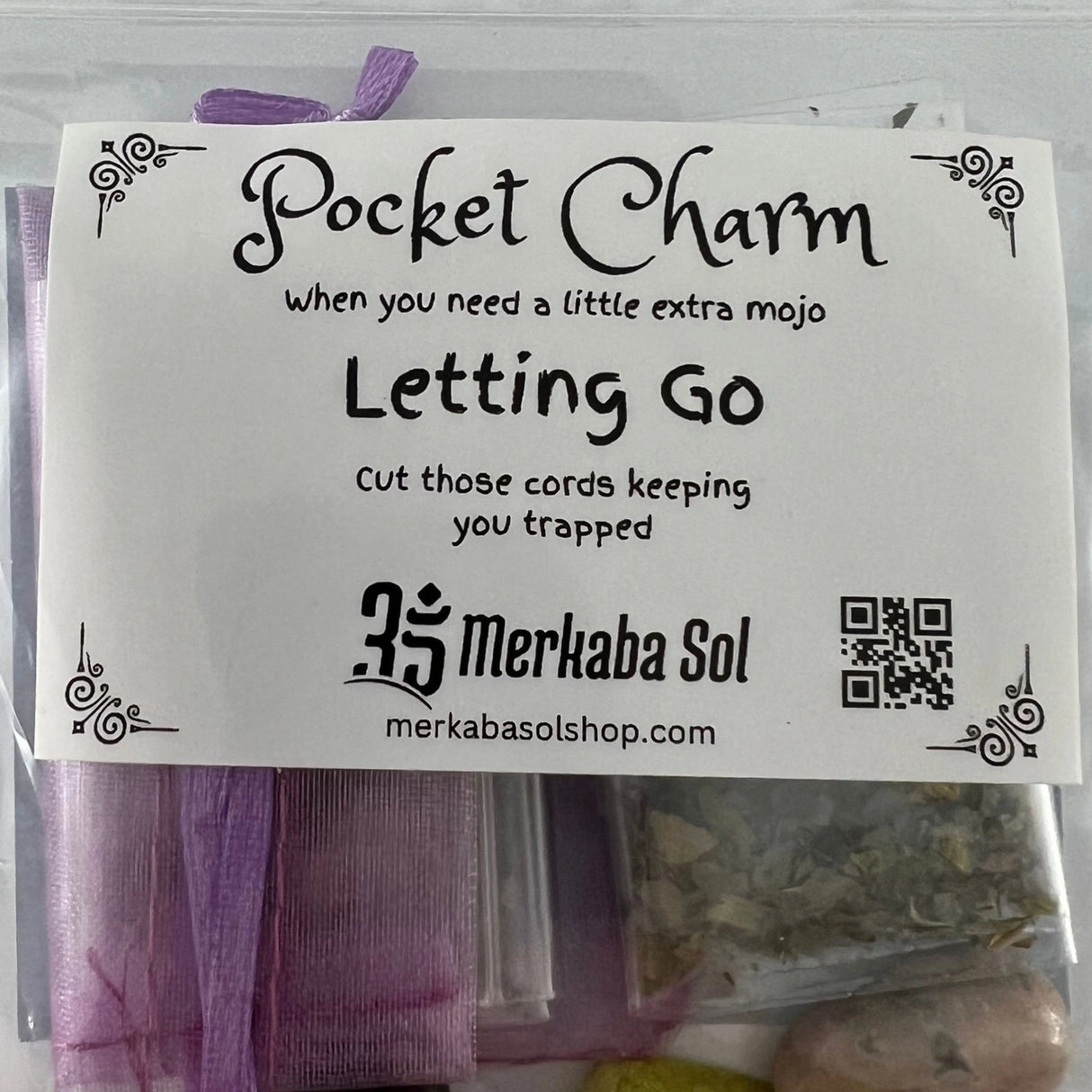 Letting Go of Old Love Pocket Charm Kit with Transparent packaging, White label, and Black text.
