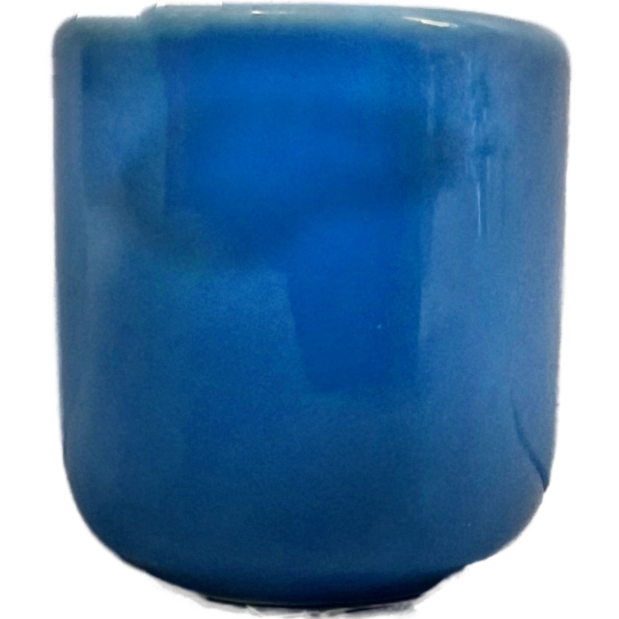 Light blue ceramic candle holder.