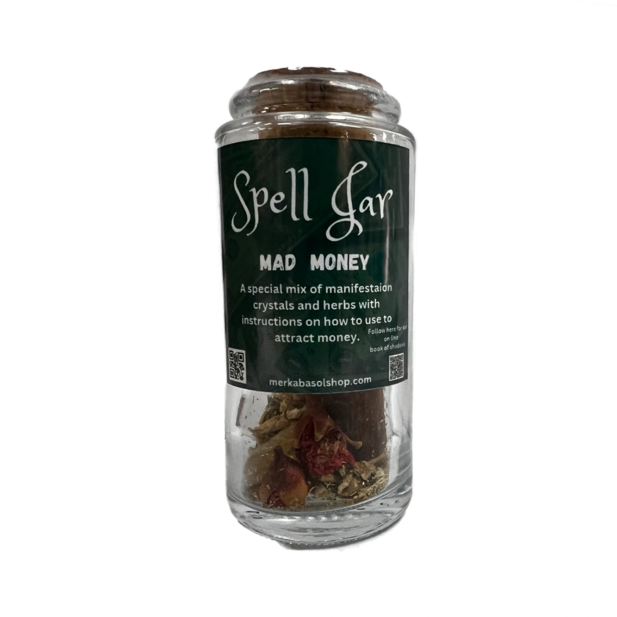 Mad Money Spell Jar filled with herbs and crystals.