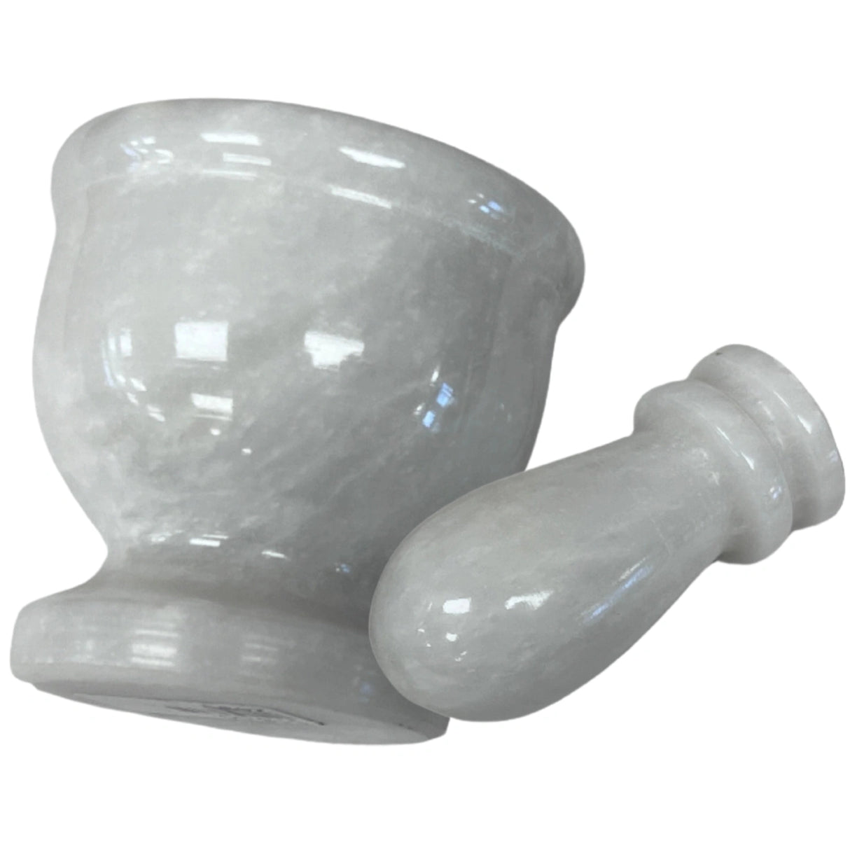White marble mortar and pestle.