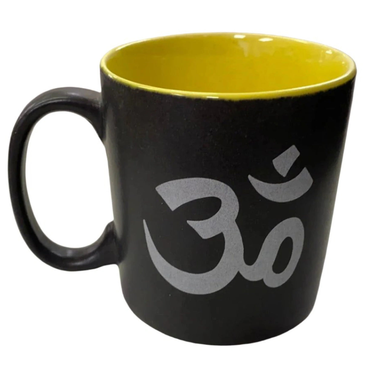 Black ceramic mug with a yellow interior and a white Om symbol.