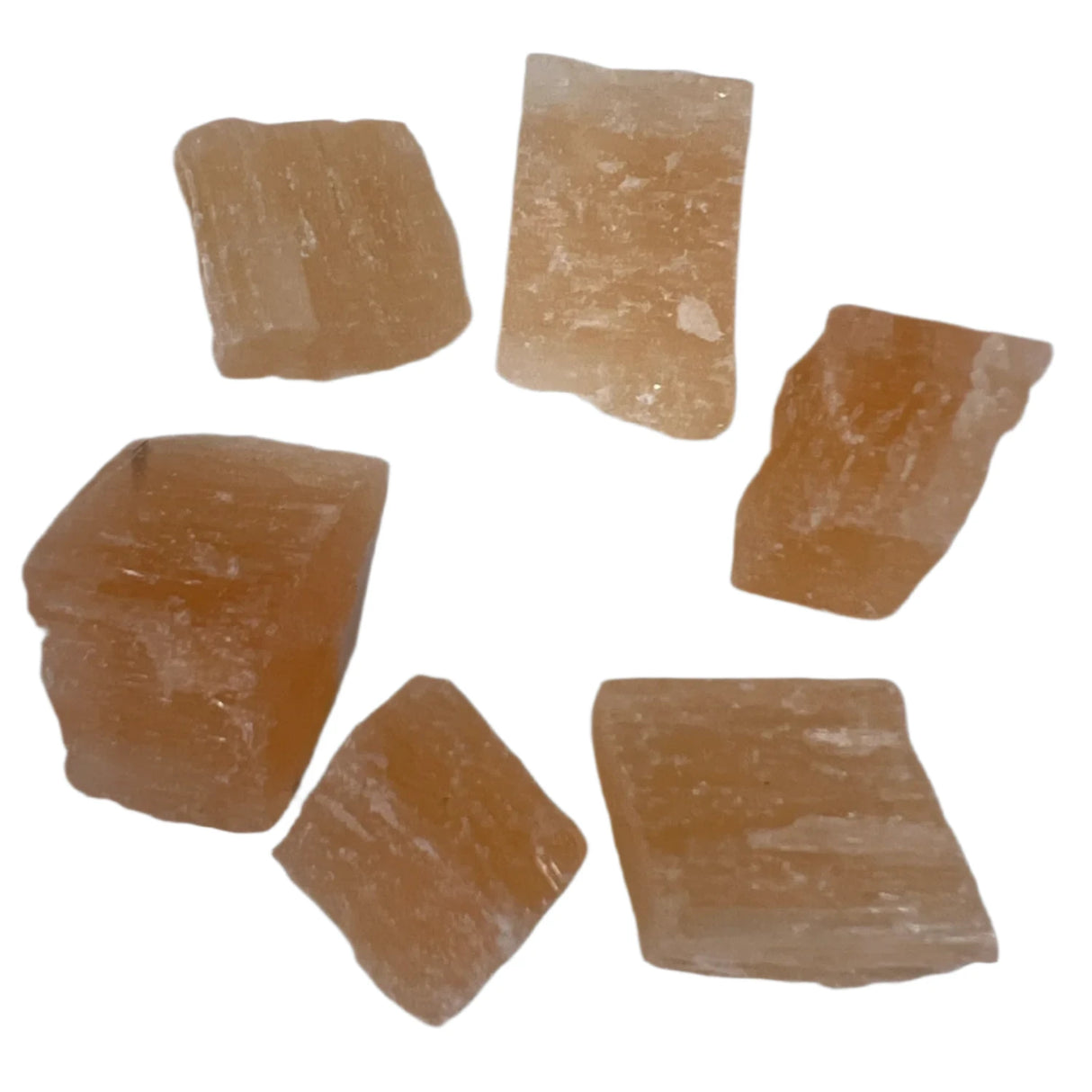 Tumbled Orange Selenite stones with a smooth, polished finish and a translucent orange color.