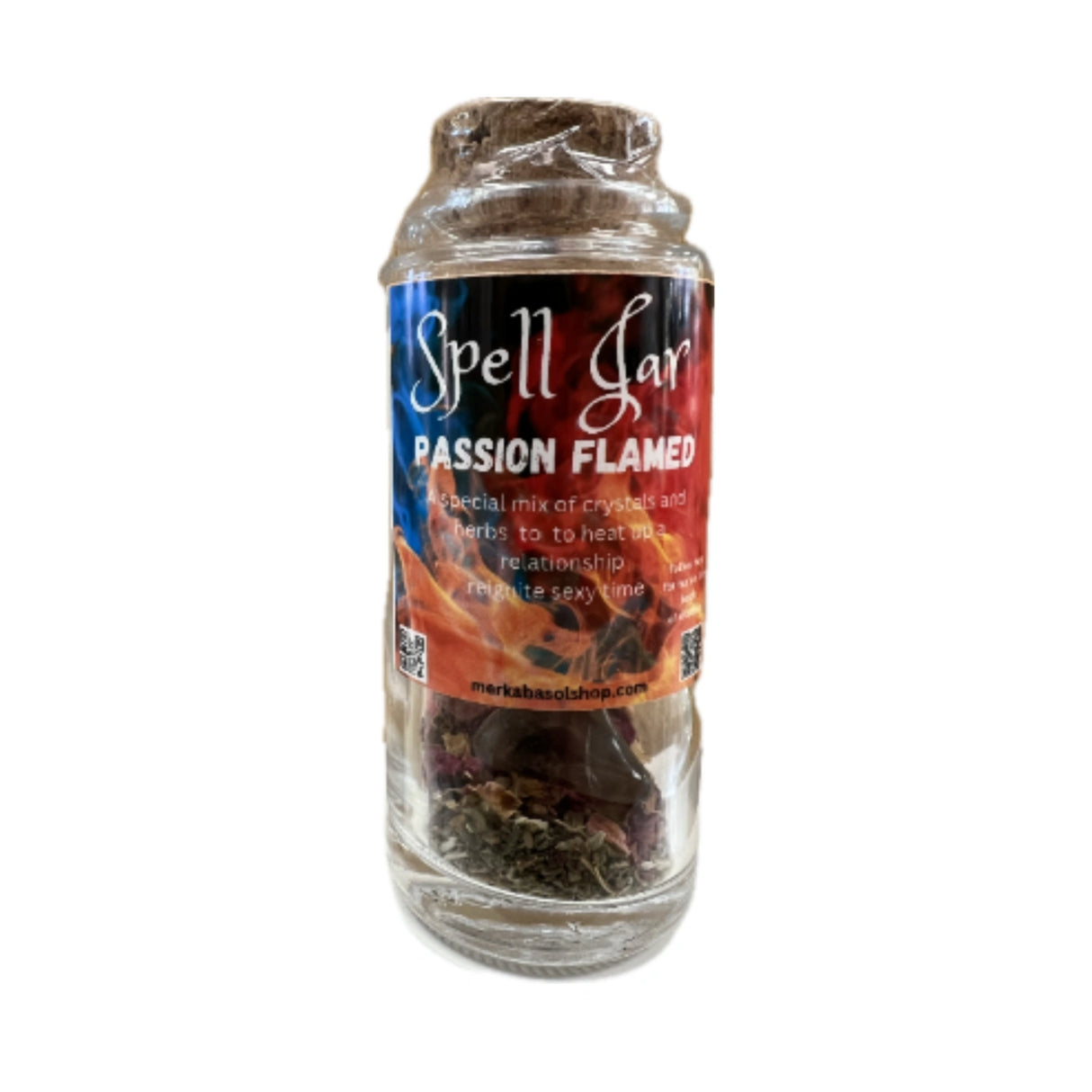 Passion Flamed Spell Jar filled with herbs and crystals.