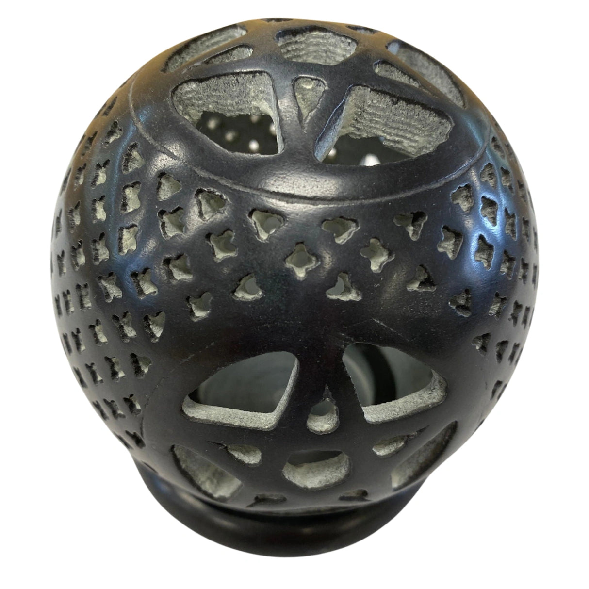 Black ceramic candle holder shaped like a sphere with a raised pentagram design.