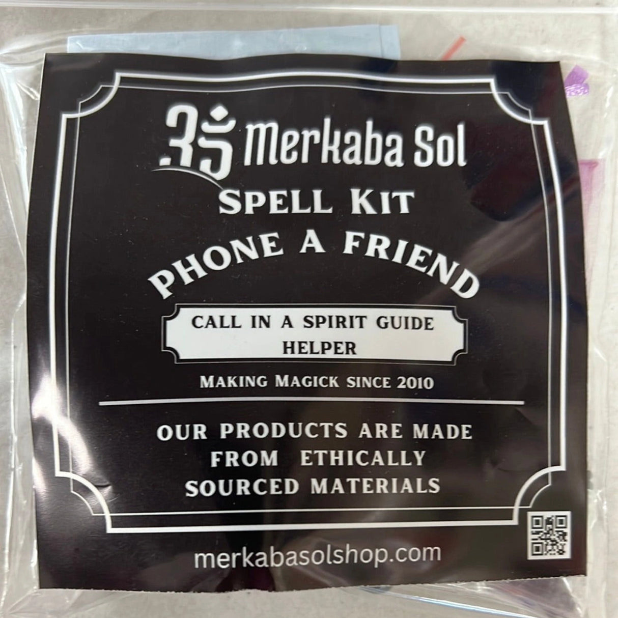 Phone a Friend Spell Kit with Transparent packaging, Black Label, and white text.