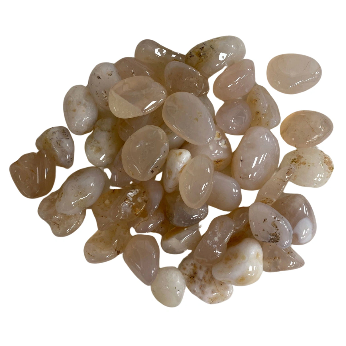 Pink Chalcedony Tumbled - Polished pink stones with translucent and opaque sections.