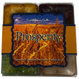 Prosperity Candle Set with yellow, green, purple, and white candles.