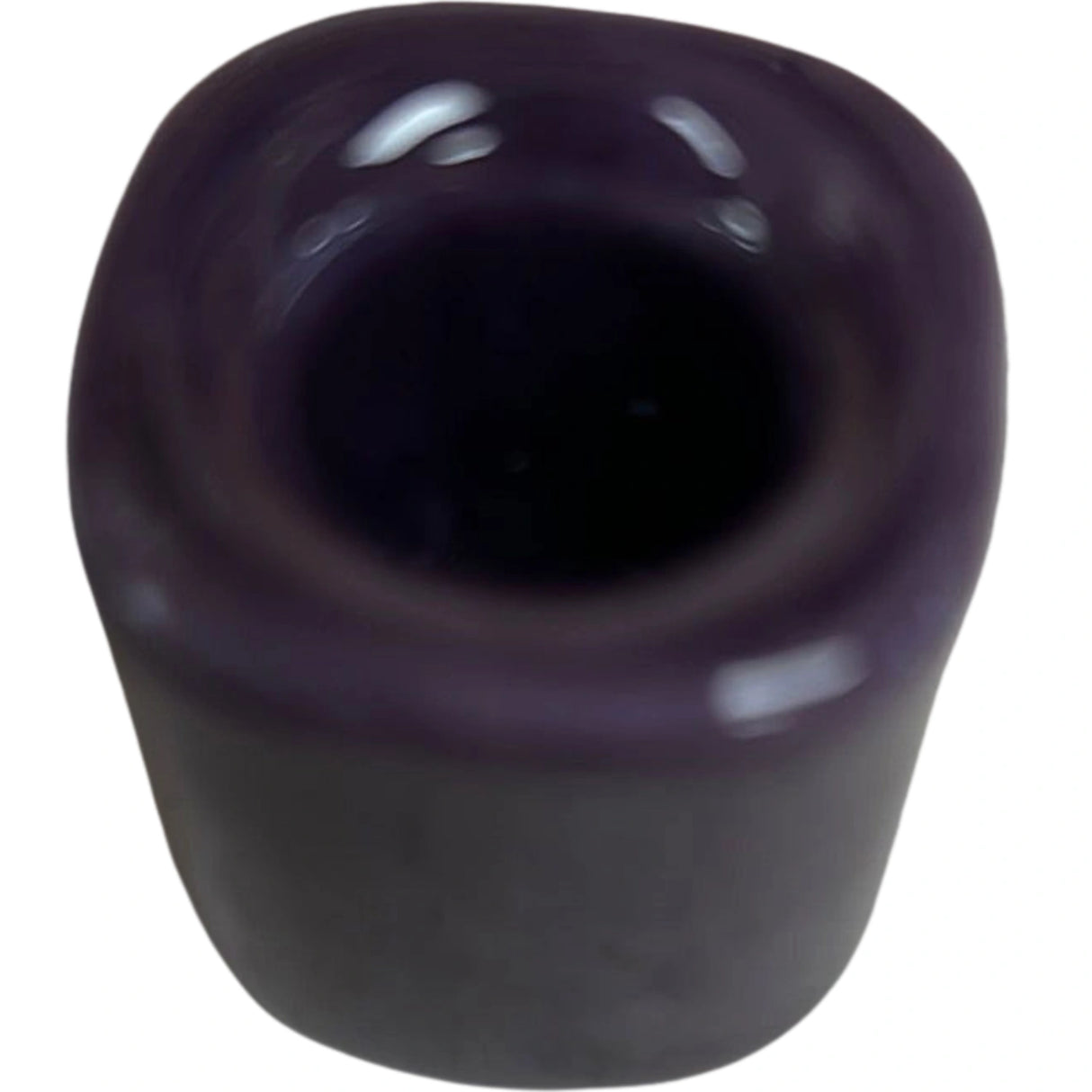 Purple ceramic candle holder.