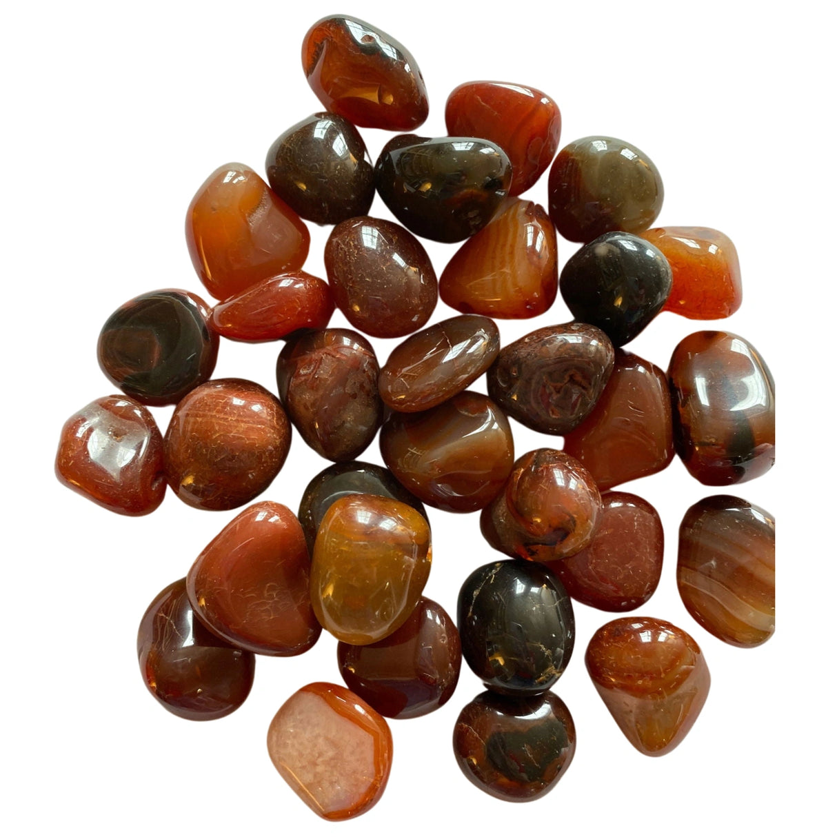 Red Agate Tumbled - Polished red agate stones with varying shades and patterns.