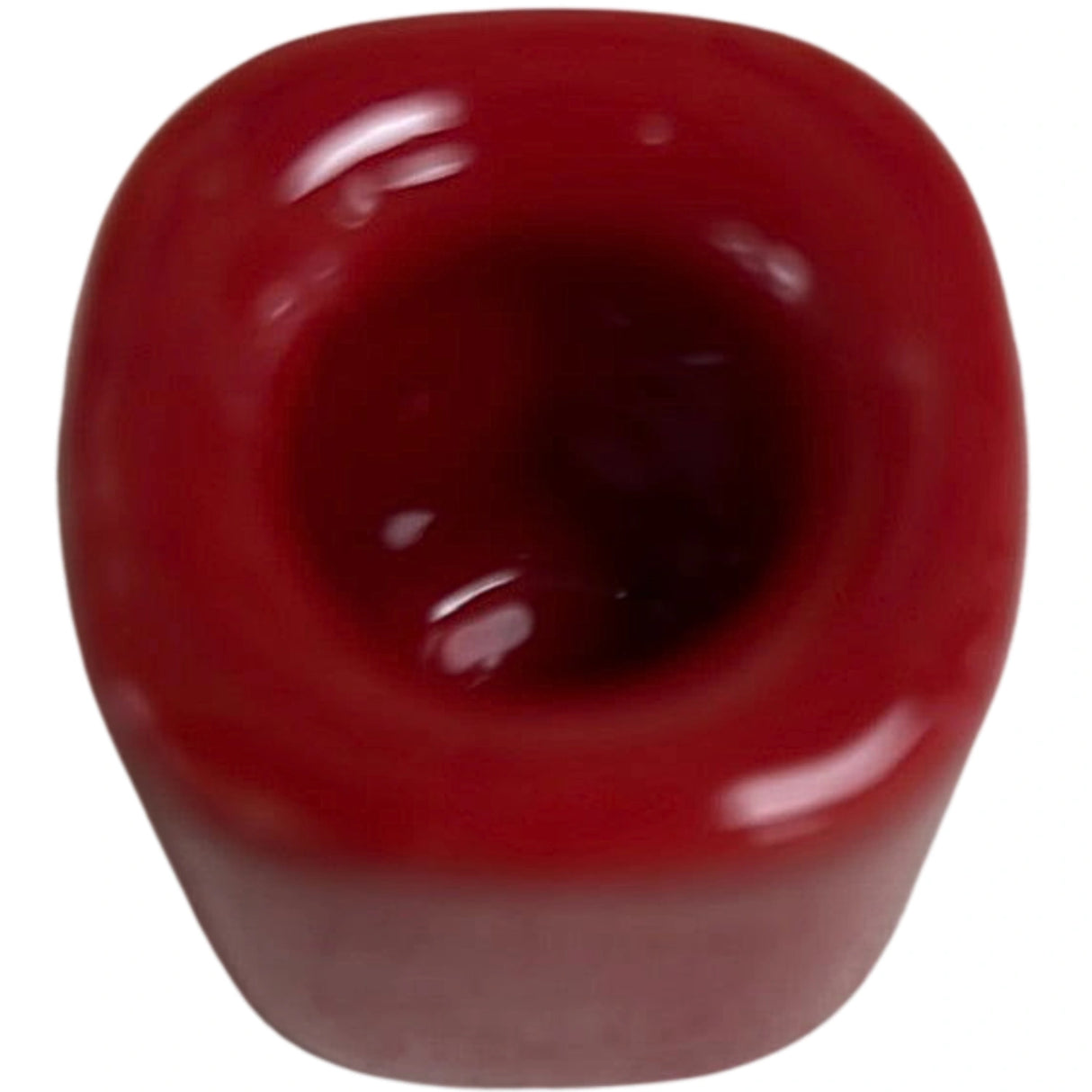 Red, square ceramic candle holder with a shallow well.