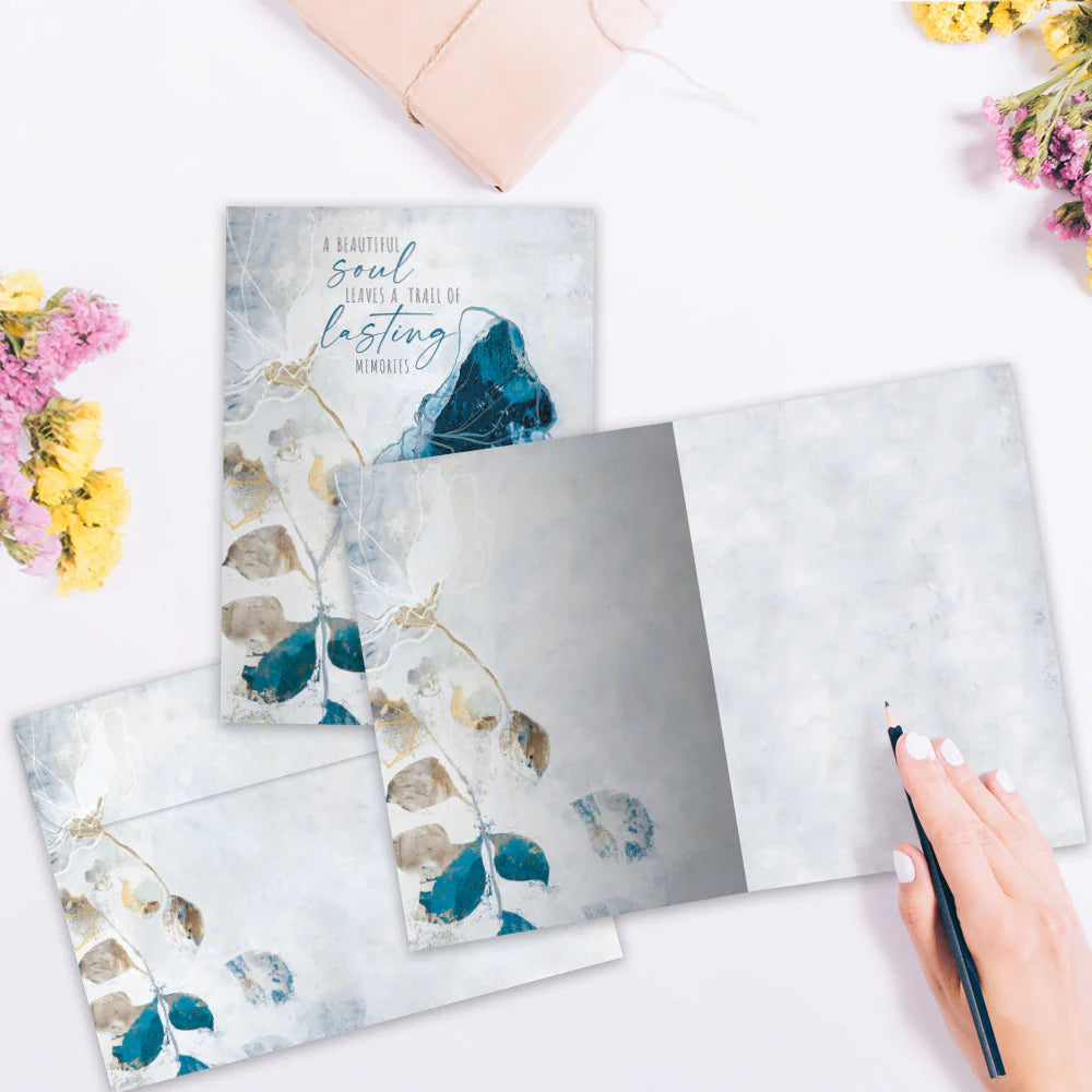 inside of card is same muted blue colors with a blank page