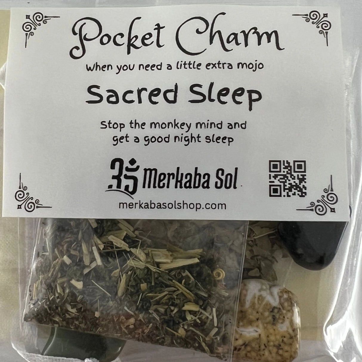 Sacred Sleep Pocket Charm Kit with Transparent packaging, White label, and Black text.