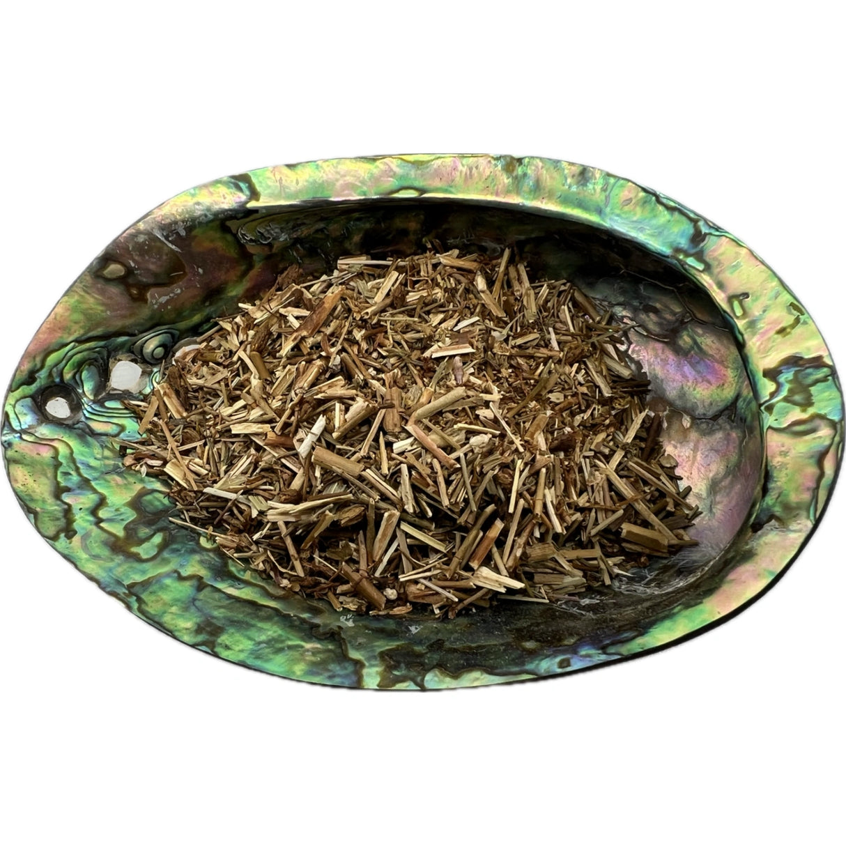 Dried St John's Wort in an abalone shell.